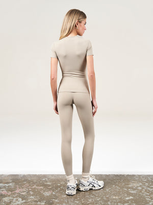 EMBLEM STRETCH SCULPTING LEGGINGS - BEIGE