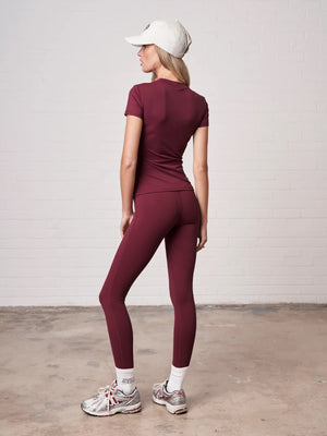 SCULPTING STRETCH EMBLEM LEGGINGS - BURGUNDY