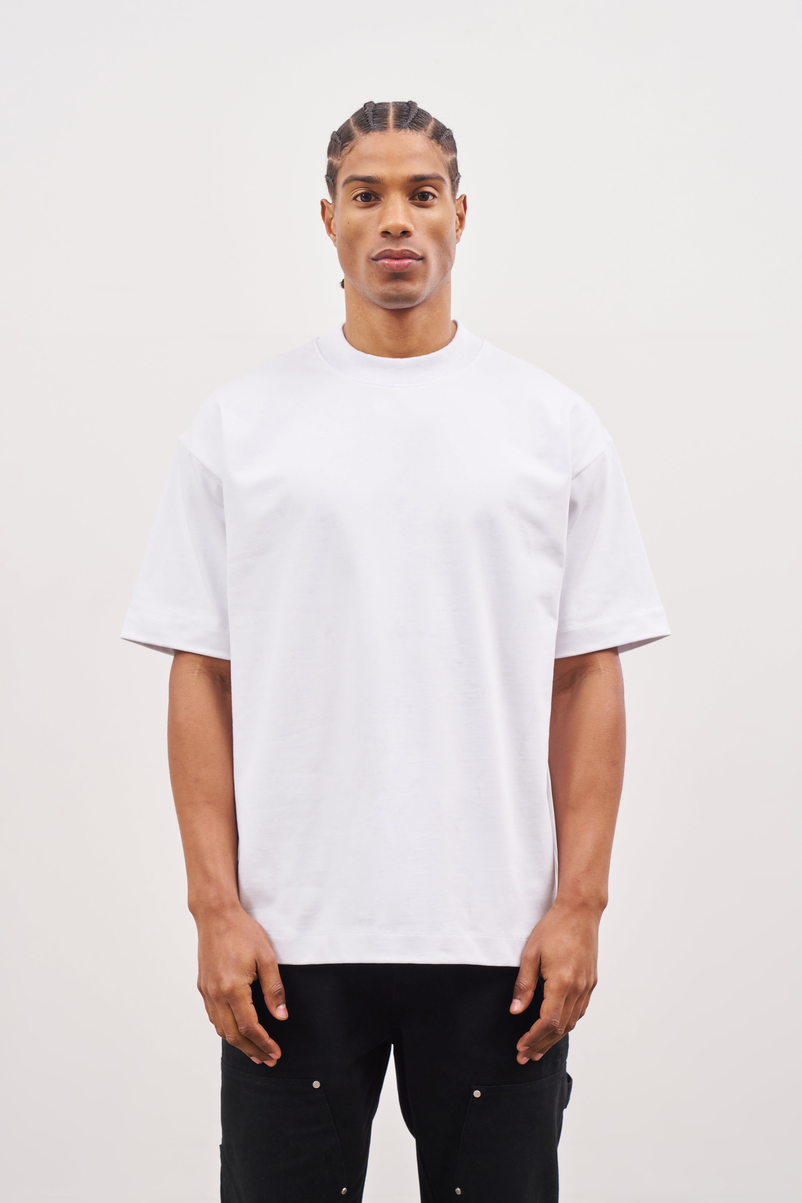 Man wearing plain white t shirt best sale