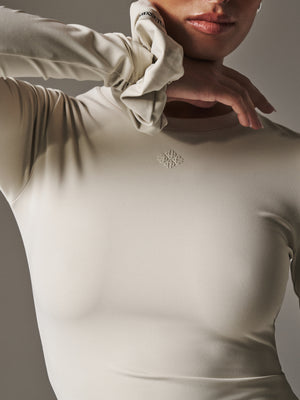 SCULPTING STRETCH LONG SLEEVE TOP - BONE