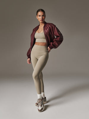 EMBLEM STRETCH SCULPTING LEGGINGS - BEIGE