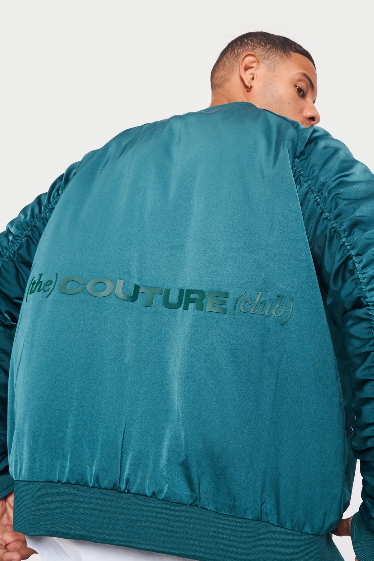 The Couture Club Satin Bomber Jacket in Teal Blue with Ruched Sleeve Detail