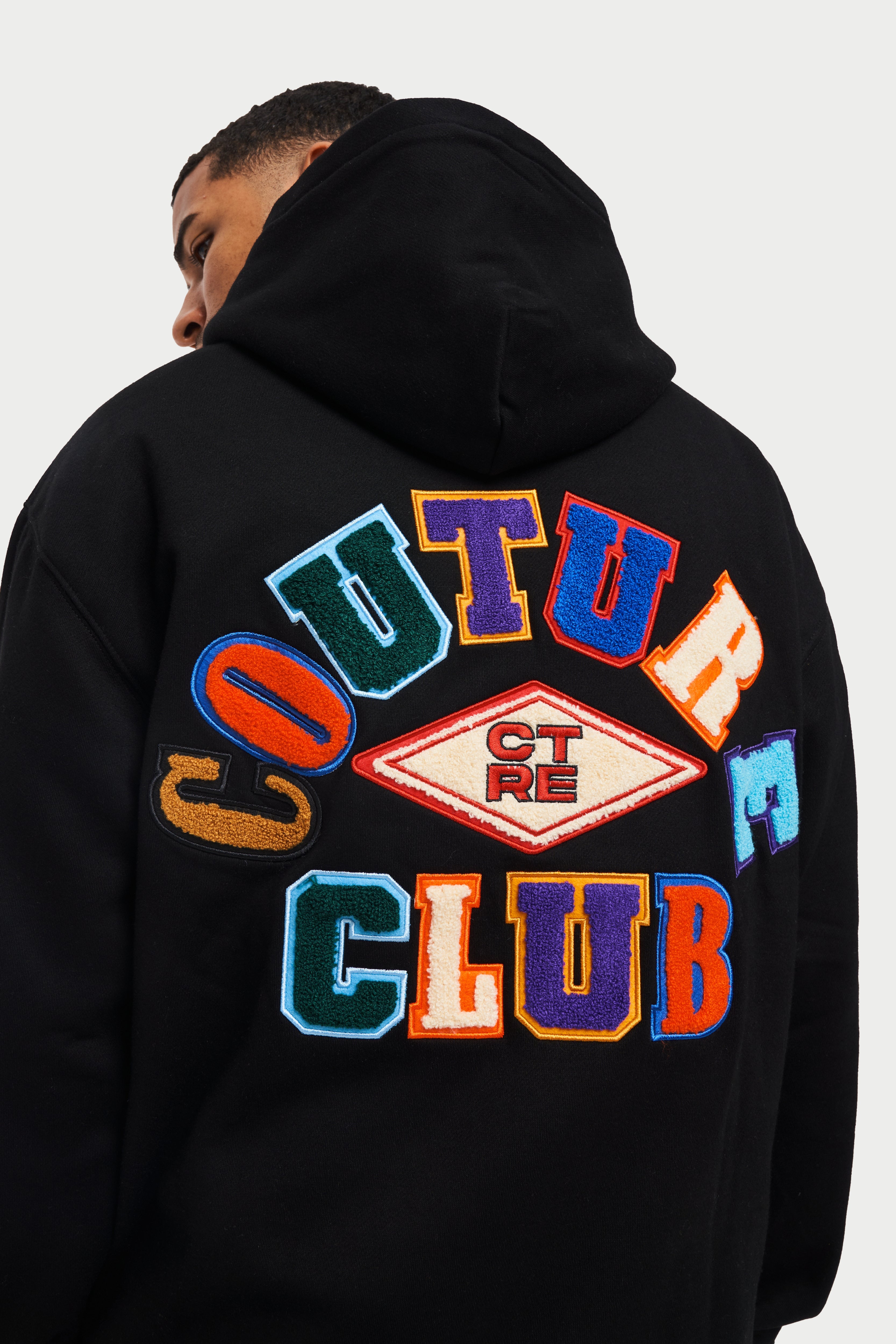 MULTI BADGED OVERSIZED HOODIE BLACK The Couture Club