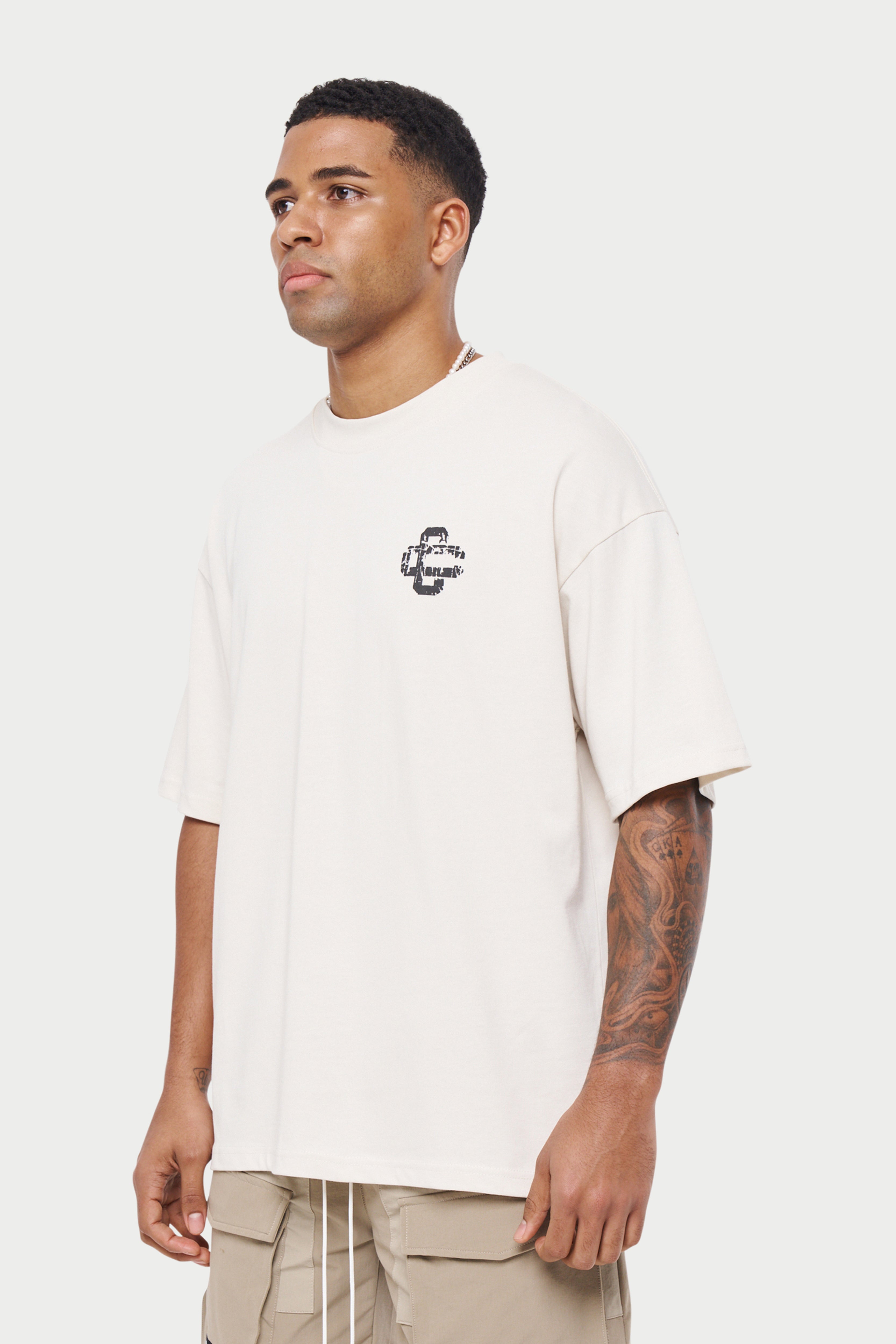 CRACKED PRINT EMBLEM RELAXED T-SHIRT - OFF WHITE – The Couture Club